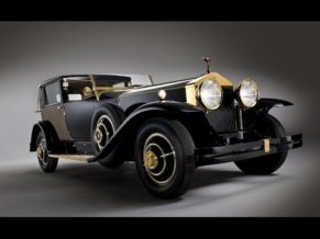 Henry Royce Bald People in History pictured is a classic old rolls royce car with gold trim