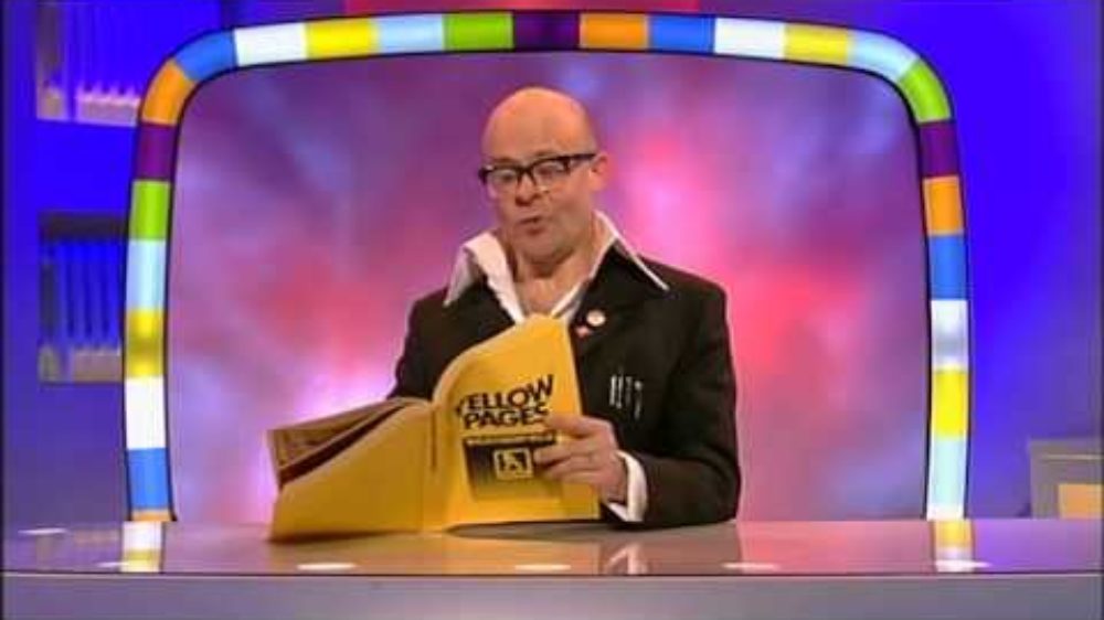 Harry Hill funny British TV Host reading the yellow pages