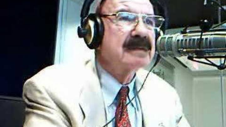 G Gordon Liddy White House Plumber talking into microphone