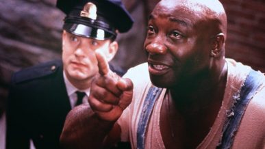 Michael Clarke Duncan scene from The Green Mile movie with tom hanks in background