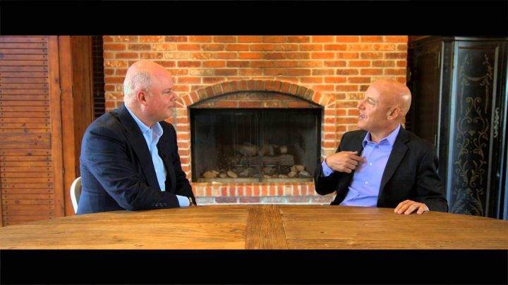 Paul Zane Pilzer interview at large wooden table