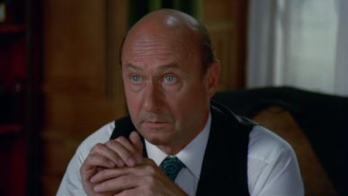 Donald Pleasence frowning with Bald Head