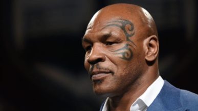 Mike Tyson Bald Head and face tattoo